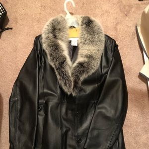 Women’s black coat with fur
